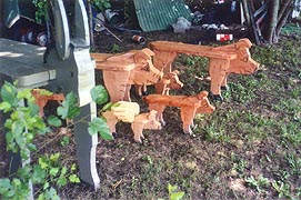 [photo, Wooden donkey and pigs, Kinder Farm Park, Millersville (Anne Arundel County), Maryland]