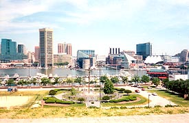 [photo, Skyline, townhouses, and marinas on Patapsco River (view from Canton), Baltimore, Maryland]